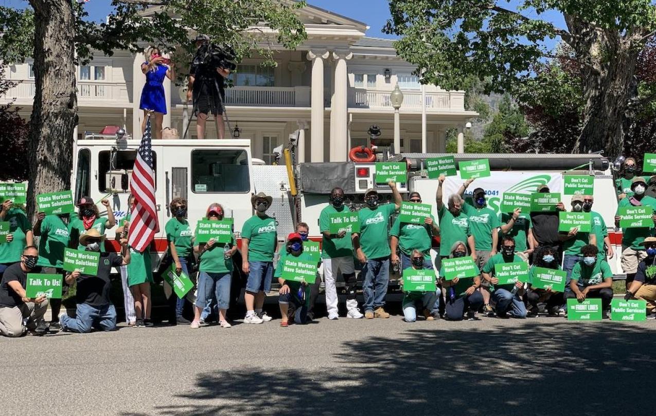 AFSCME Local 4041 members and supporters rally outside the Governor's Mansion in Carson City 