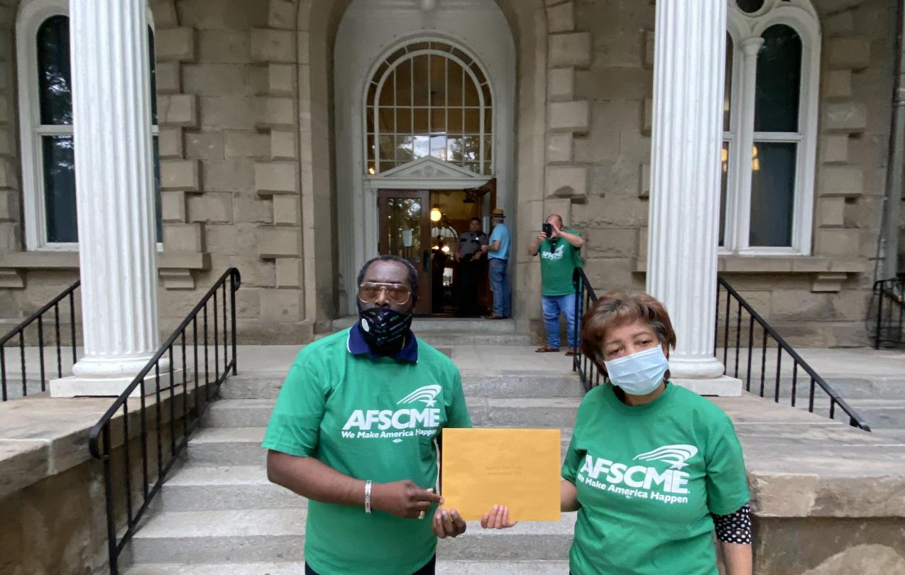 AFSCME Local 4041 members deliver UPL to Governor in Carson City 