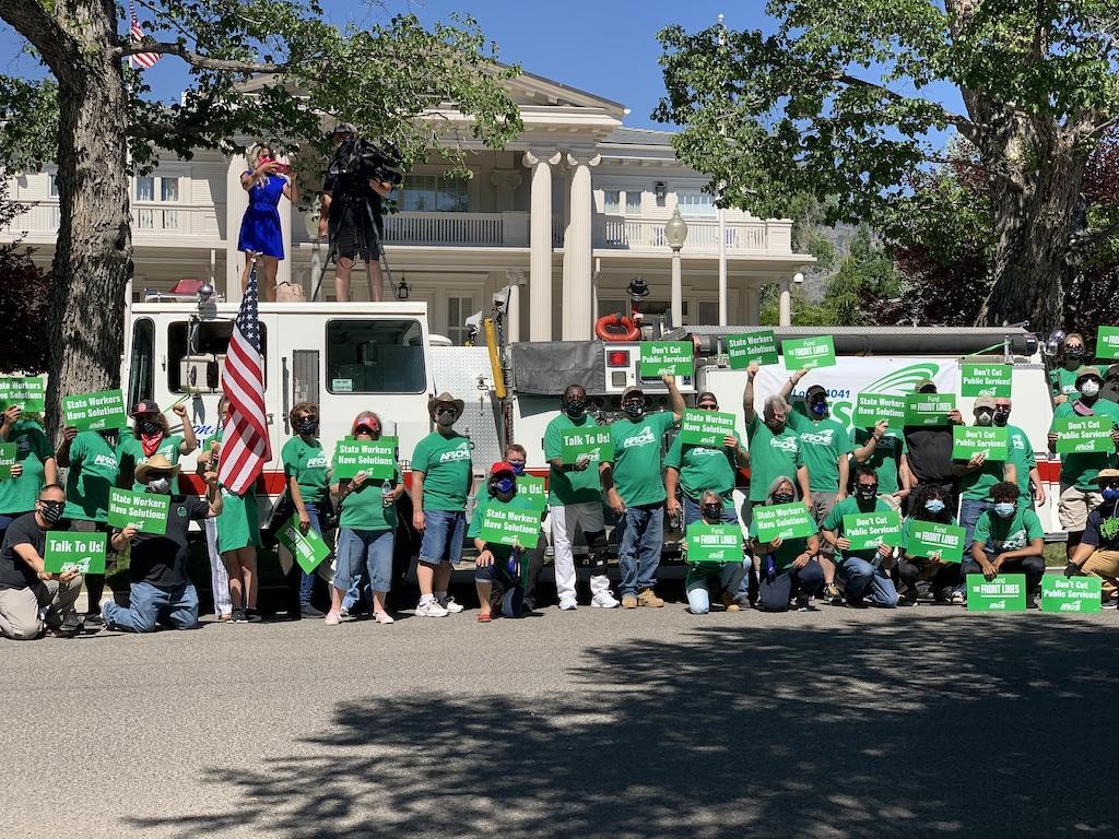 AFSCME Local 4041 members and supporters rally outside the Governor's Mansion in Carson City 