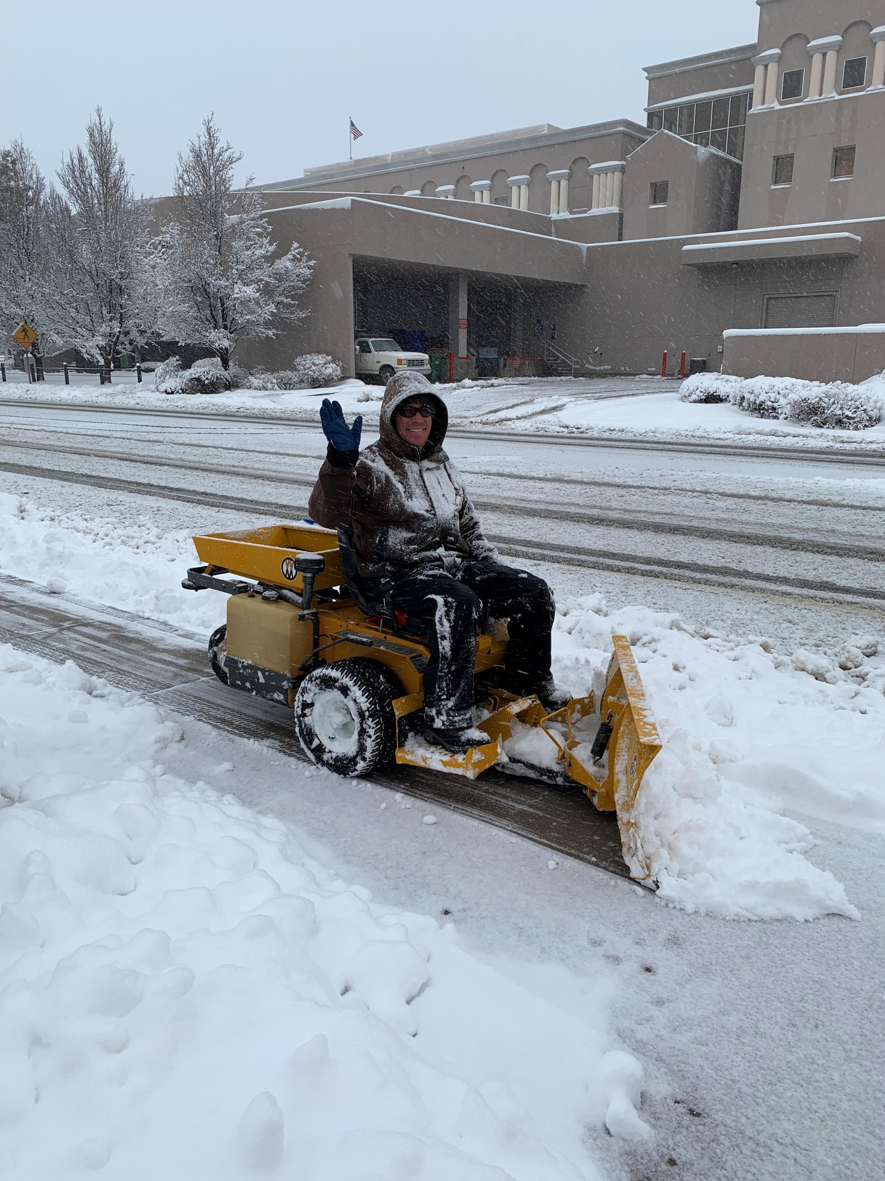 Nevada state employee clears snow off Carson City sidewalk by the State Legislature on Monday Feb 4th. Photo: Battle Born Progress